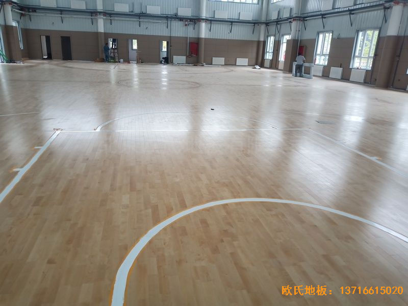 新疆克拉瑪依市獨山子虹園小區體育館運動木地板安裝案例